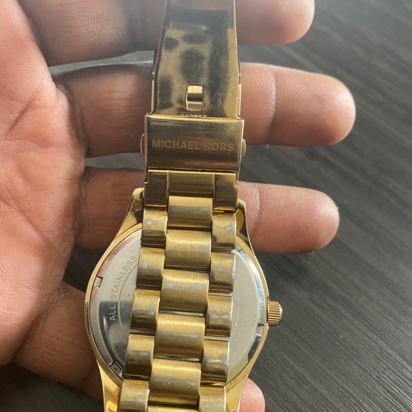 Michael Kors Gold Continents Designer 